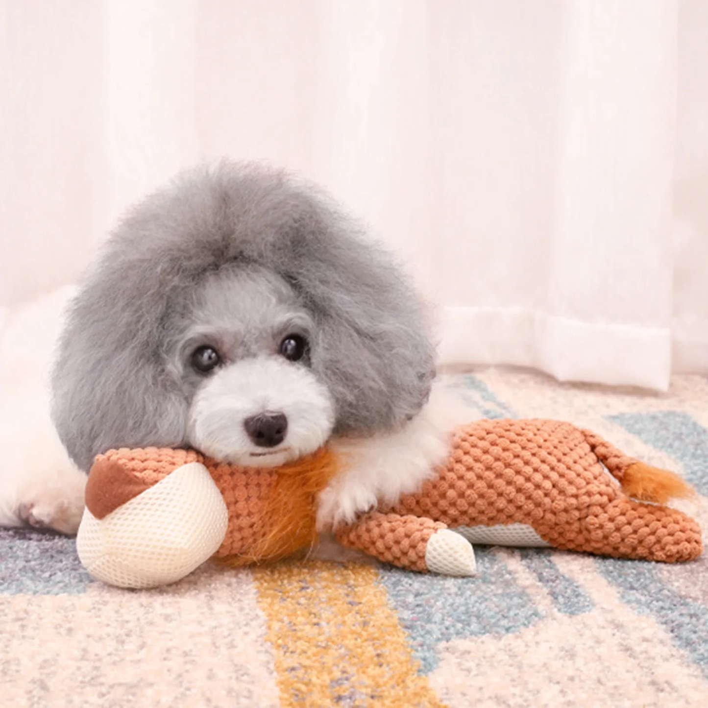 Jouet sonore en peluche côtelée